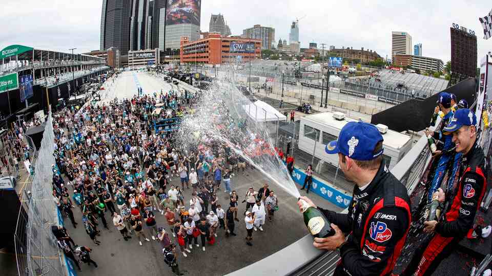 Drivers celebrate with fans