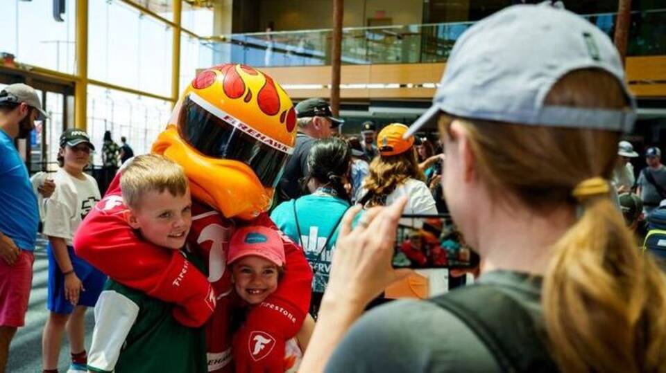 Fans pose with Firehawk